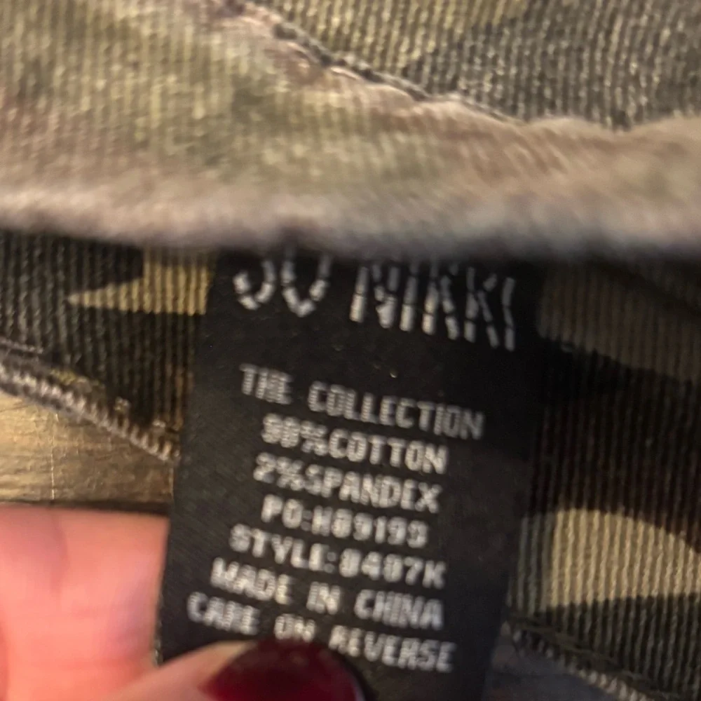So Nikki Camouflage Distressed Skirt